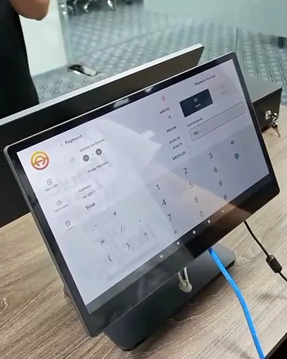 Payment in a few taps: Cash tendered, change worked out — on both screens.